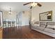 Spacious living room featuring hardwood floors, a ceiling fan, and comfortable seating at 1130 Ganton Way, Myrtle Beach, SC 29588