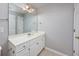 Bathroom featuring white vanity with ample storage and a large mirror at 117 Butkus Dr. # 5, Myrtle Beach, SC 29588