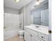Well-lit bathroom featuring a white vanity with ample storage and a shower-tub combo at 117 Butkus Dr. # 5, Myrtle Beach, SC 29588