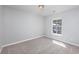 Bright bedroom featuring neutral walls, carpet, and lots of natural light at 117 Butkus Dr. # 5, Myrtle Beach, SC 29588