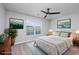 Comfortable bedroom featuring a well-made bed, stylish artwork, and lots of natural light at 117 Butkus Dr. # 5, Myrtle Beach, SC 29588