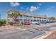 Spacious two-story condo building featuring ample parking, and well-maintained landscaping at 117 Butkus Dr. # 5, Myrtle Beach, SC 29588