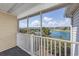 Enjoy serene lake views from this screened in balcony area at 117 Butkus Dr. # 5, Myrtle Beach, SC 29588