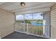 Charming screened porch overlooking the lake with ample space for outdoor seating and relaxation at 117 Butkus Dr. # 5, Myrtle Beach, SC 29588