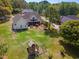 Aerial view of property with spacious backyard, mature trees, and outdoor living area at 120 Wraggs Ferry Rd., Georgetown, SC 29440