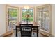Charming breakfast nook with bay windows overlooking the garden at 120 Wraggs Ferry Rd., Georgetown, SC 29440
