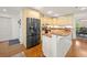 Well-equipped kitchen with stainless steel refrigerator and granite countertops at 120 Wraggs Ferry Rd., Georgetown, SC 29440