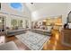 Open concept living room with wood floors and a view to the kitchen at 120 Wraggs Ferry Rd., Georgetown, SC 29440