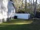 Green lawn with white privacy fence surrounding backyard at 1208 Mackie Circle, Myrtle Beach, SC 29579