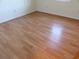 Bedroom with hard wood floors, and natural light coming in from the window at 1208 Mackie Circle, Myrtle Beach, SC 29579
