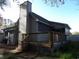 Charming home with a deck and chimney, set amongst beautiful trees at 1208 Mackie Circle, Myrtle Beach, SC 29579