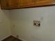 Laundry room with washer hookups, cabinets, and vinyl flooring at 1208 Mackie Circle, Myrtle Beach, SC 29579