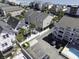 High angle view of home with outdoor in-ground pool, parking, and privacy fence at 1210 A S Ocean Blvd., Surfside Beach, SC 29575