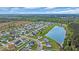 Overhead perspective of a housing development featuring a tranquil pond and neatly arranged residences at 1340 Valor Rd., Conway, SC 29527
