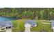 Charming single-Gathering home with a manicured front yard and an attached two-car garage, aerial view at 1340 Valor Rd., Conway, SC 29527