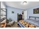 This bedroom features light blue walls, and large windows with natural light at 1340 Valor Rd., Conway, SC 29527