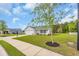 A nice house with a well-maintained lawn, a driveway, and lush landscaping at 1340 Valor Rd., Conway, SC 29527