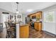 Well-equipped kitchen with wooden cabinets, granite countertops, and a convenient breakfast bar at 1340 Valor Rd., Conway, SC 29527