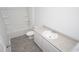 Bathroom featuring a white tub and single vanity at 144 Ashworth Dr., Tabor City, NC 28463