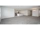 Open floor plan with kitchen, living, and dining areas, featuring luxury vinyl plank flooring at 144 Ashworth Dr., Tabor City, NC 28463