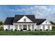 Charming new construction home with black framed windows, a covered porch, and a well-manicured front yard at 1464 Hawthorn Dr., Pawleys Island, SC 29585