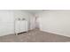 Bedroom with neutral carpet, a white dresser, and white doors at 147 Ashworth Dr., Tabor City, NC 28463