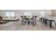 Bright dining area featuring a glass table with seating for four, open to the living area at 147 Ashworth Dr., Tabor City, NC 28463