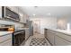 Modern kitchen with stainless steel appliances and ample counter space at 147 Ashworth Dr., Tabor City, NC 28463