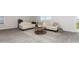 Inviting living room featuring neutral sofas and a rustic round wood coffee table on an area rug at 147 Ashworth Dr., Tabor City, NC 28463