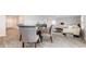 Open-concept dining and living space featuring modern finishes and hardwood flooring at 147 Ashworth Dr., Tabor City, NC 28463