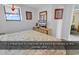 Bedroom featuring additional windows for extra light, with a TV for enjoyment at 1690 N Waccamaw Dr. # 1008, Garden City Beach, SC 29576
