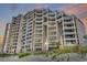 Exterior of building showing multiple balconies overlooking the beach and ocean at 1690 N Waccamaw Dr. # 1008, Garden City Beach, SC 29576