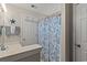 Well-lit bathroom featuring a bathtub/shower combo and updated vanity at 176 Somerworth Circle, Surfside Beach, SC 29575
