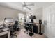 Functional bedroom with a music recording setup, neutral colors and lots of light at 176 Somerworth Circle, Surfside Beach, SC 29575