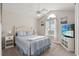 Comfortable bedroom featuring neutral colors, a ceiling fan, and lots of light at 176 Somerworth Circle, Surfside Beach, SC 29575