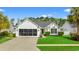 Charming single-story home with a screened garage and a well-maintained front lawn at 176 Somerworth Circle, Surfside Beach, SC 29575
