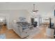 Cozy living room with vaulted ceilings, ceiling fan, and comfortable seating arrangement at 176 Somerworth Circle, Surfside Beach, SC 29575