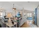 Open-concept living room with a view to the dining area and eat-in kitchen at 176 Somerworth Circle, Surfside Beach, SC 29575