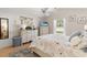 Comfortable main bedroom featuring coordinating decor and lots of natural light at 176 Somerworth Circle, Surfside Beach, SC 29575