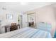 Bedroom featuring a neatly made bed, writing desk, and dresser, offering a calm and relaxing retreat at 1950 Bent Grass Dr. # K, Surfside Beach, SC 29575