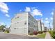 Attractive condo building with well-kept grounds, showcasing a desirable and convenient living space at 1950 Bent Grass Dr. # K, Surfside Beach, SC 29575