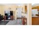 Open-concept living and kitchen area with a foyer, kitchen, and living area at 1950 Bent Grass Dr. # K, Surfside Beach, SC 29575
