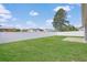 Large backyard features a privacy fence, offering a secure outdoor area for relaxation and recreation at 200 Palm Terrace Loop, Conway, SC 29526