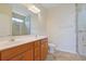 Bathroom with double sink vanity, ceramic tile flooring, and glass shower at 200 Palm Terrace Loop, Conway, SC 29526