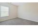 This room has a neutral carpet, one window that brings in natural light and a wall outlet at 200 Palm Terrace Loop, Conway, SC 29526