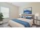 Comfortable bedroom with plush carpeting, large window and mountain themed wall art above the bed at 200 Palm Terrace Loop, Conway, SC 29526