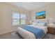 Inviting bedroom featuring a queen-size bed and a large window at 200 Palm Terrace Loop, Conway, SC 29526