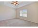 Cozy bedroom offering natural light, carpet, and a tray ceiling at 200 Palm Terrace Loop, Conway, SC 29526