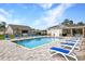 Enjoy the neighborhood community pool with chairs and tables for residents at 200 Palm Terrace Loop, Conway, SC 29526