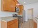 Kitchen with stainless steel appliances, granite countertops, and wood cabinets at 200 Palm Terrace Loop, Conway, SC 29526